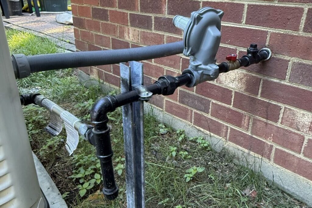 Gas line and regulator connection for a Generac standby generator